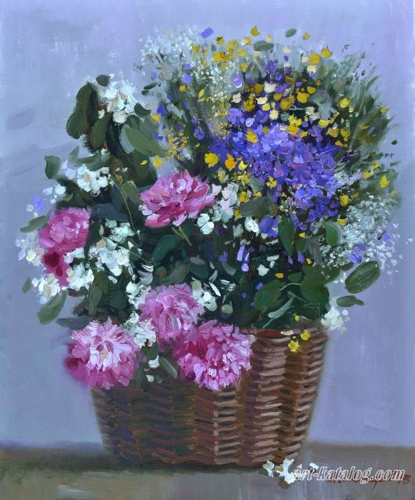 Bouquet of summer flowers in a basket