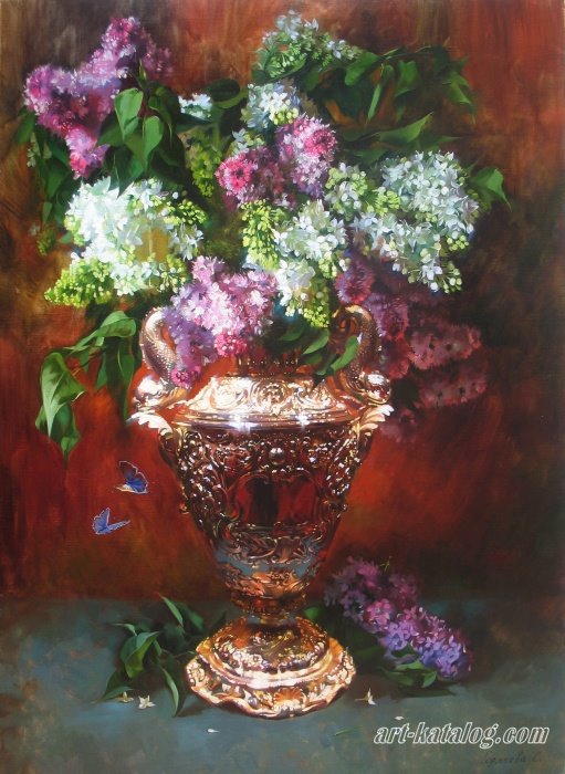 Lilacs in a gold vase