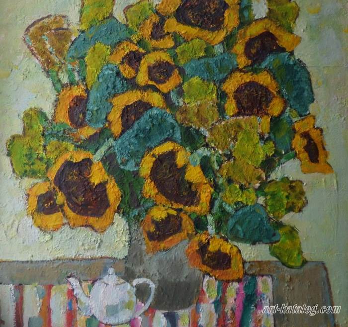 Sunflowers and white teapot