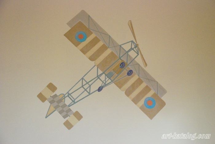 Airplane. Wall painting in nursery 